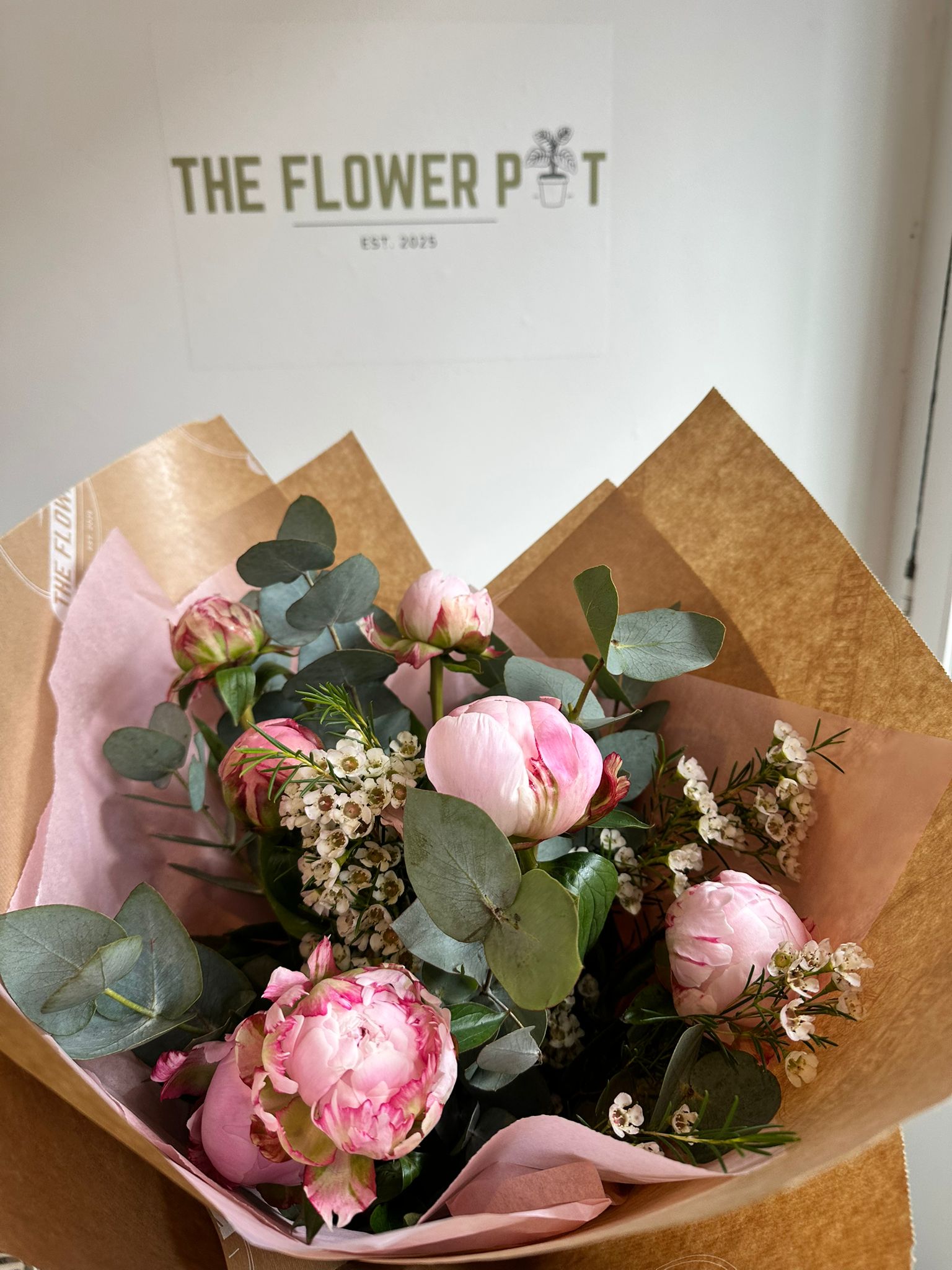 Peony bouquet featuring lush pink and white peonies arranged in a floral bouquet by The Flower Pot Swindon LTD.