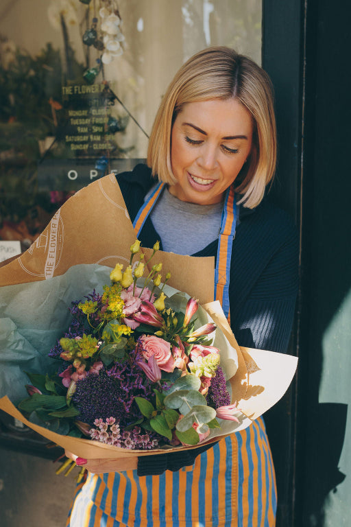 Workshop image for The Flower Pot Academy 6-Week Florist Course by The Flower Pot Swindon LTD, showing floral arrangements and tools.