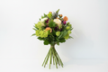 Spring Sunshine Bouquet from The Flower Pot Swindon LTD featuring vibrant mixed flowers in a lush bouquet arrangement.